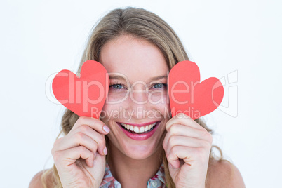 Woman holding heart cards