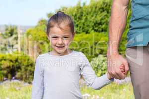 Father and daughter smiling at camera