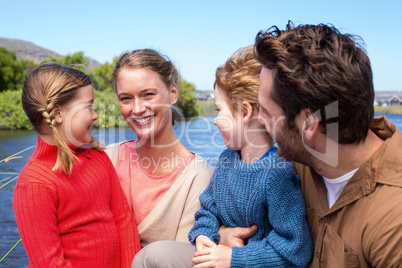 Happy family at a lake