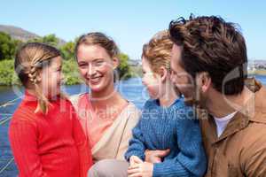 Happy family at a lake