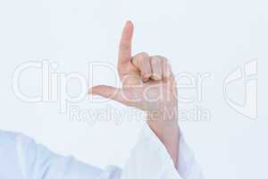 Doctor pointing up with finger