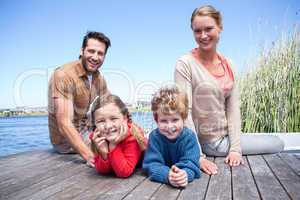 Happy family at a lake