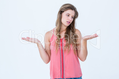 Unsure woman gesturing do not know sign