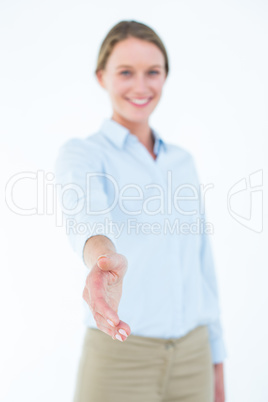 Smiling businesswoman offering handshake Smiling businesswoman offering handshake