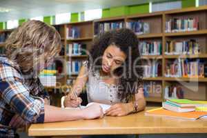 Students studying together in the library