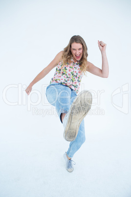 Woman doing karate kick