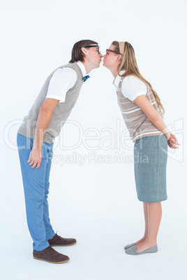 Geeky hipster couple kissing