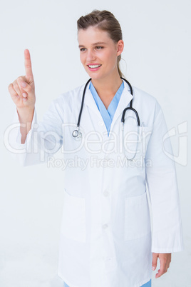 Doctor standing with finger up