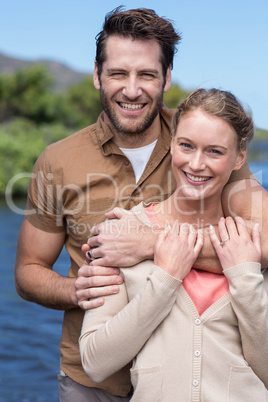 Happy couple at a lake