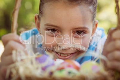 Cute little girl with easter eggs