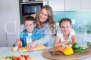 Happy family preparing lunch together