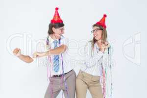 Happy geeky couple dancing