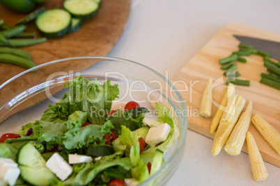 Salad and vegetables on table