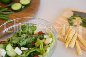 Salad and vegetables on table