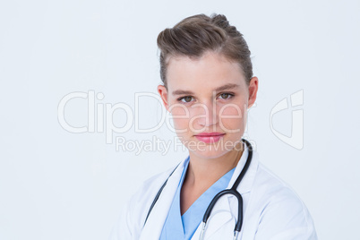 Smiling doctor looking at camera