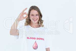 Blood donor showing okay sign