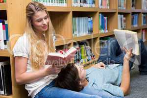 Students reading together in the library