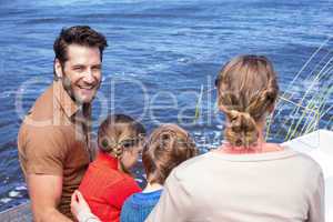 Happy family at a lake