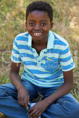 Cute little boy smiling at camera