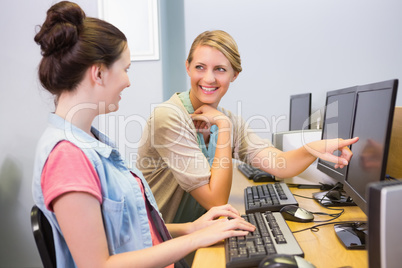 Students working on computer together