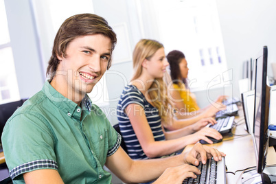 Side view of students in computer class