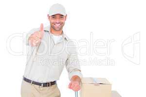 Delivery man gesturing thumbs up on white background