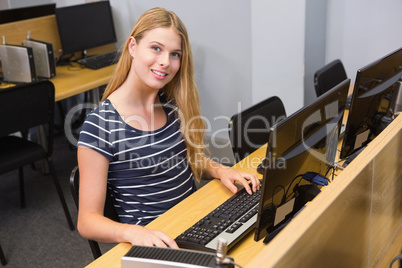 Student working on computer in classroom