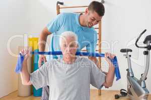 Senior man training with his coach