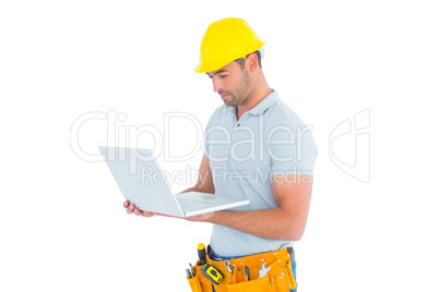 Handyman using laptop