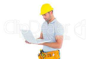 Handyman using laptop