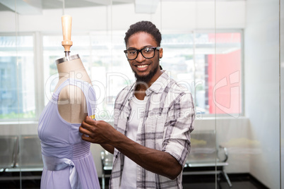 Male fashion designer and mannequin