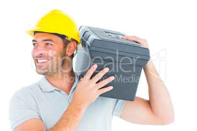 Handyman carrying toolbox on shoulder