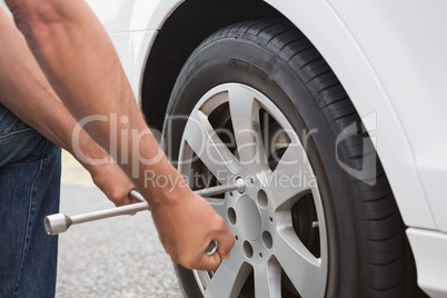 Man fixing tire