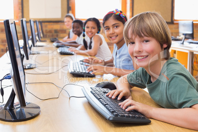 Cute pupils in computer class