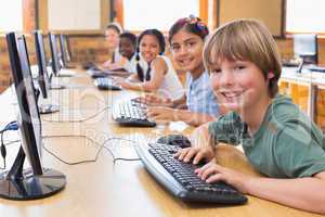 Cute pupils in computer class