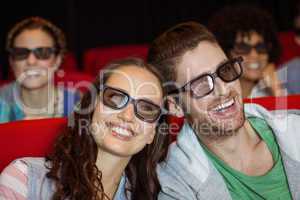 Young couple watching a 3d film