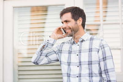 Happy man on a phone call