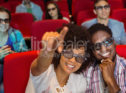 Young couple watching a 3d film