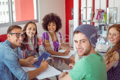 Fashion students smiling at camera