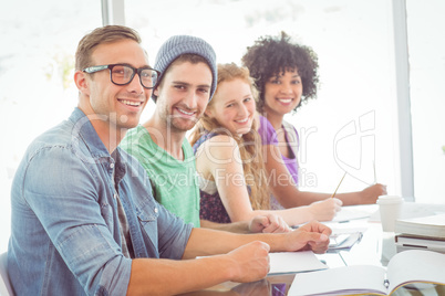 Fashion students smiling at camera