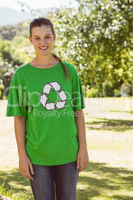 Environmental activist smiling at camera in the park