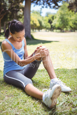 Fit woman with injured knee