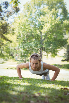 Fit woman in plank position