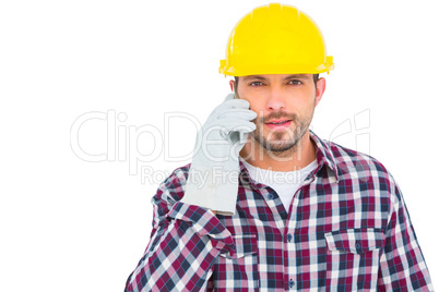 Repairman talking on mobile phone