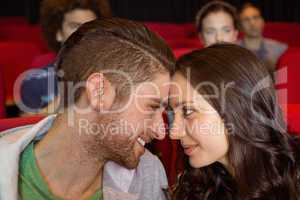 Young couple watching a film