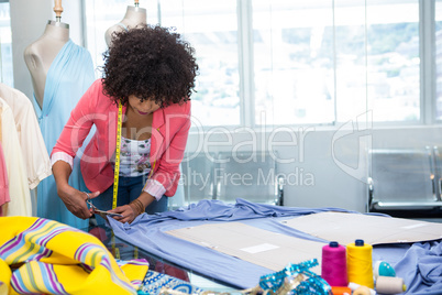 Female fashion designer at work