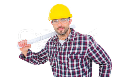 Handyman holding rolled up blueprint