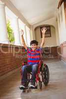 Boy in wheelchair in school corridor