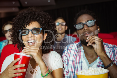 Young couple watching a 3d film