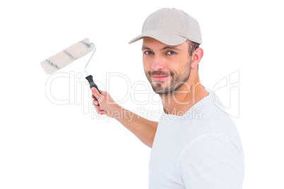 Handyman holding paint roller